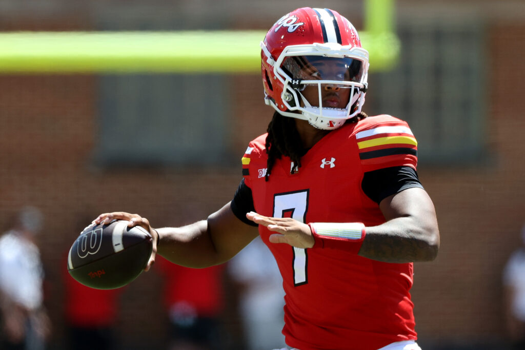 Maryland Terrapins quarterback Malik Washington (7) looks to throw the ball